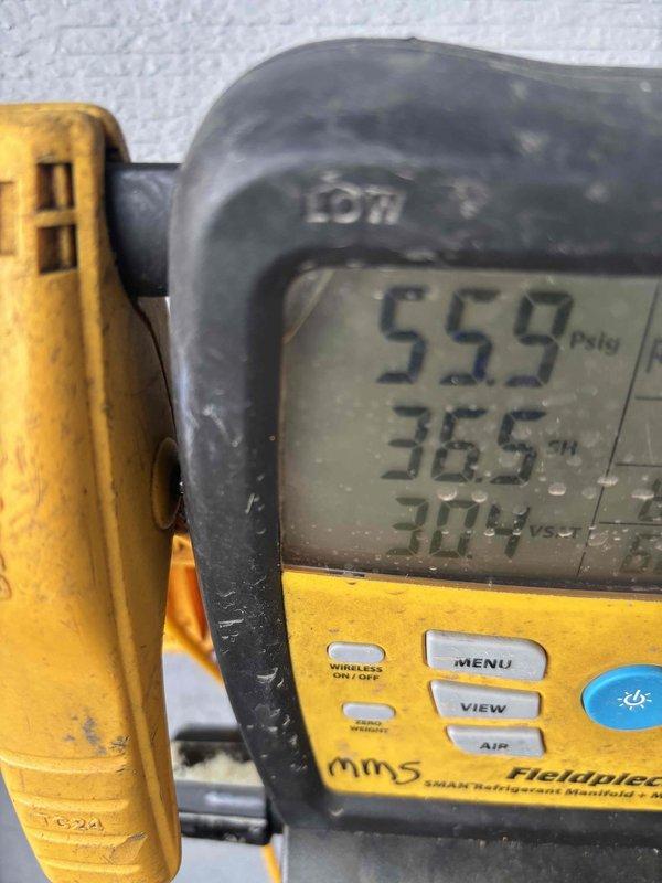 Performed complete clean and check maintenance service on residential air conditioning system located on second floor unit. Verified system operating parameters using digital manifold gauge, recording suction pressure of 55.9 PSIG with superheat reading of 36.5°F, indicating proper refrigerant charge and system performance. Measured supply and return air temperatures with calibrated digital thermometers to confirm adequate temperature split across evaporator coil. Installed protective mesh screening into accessible ductwork using ladder to prevent debris infiltration and maintain indoor air quality. System found to be operating within manufacturer specifications with no deficiencies noted.