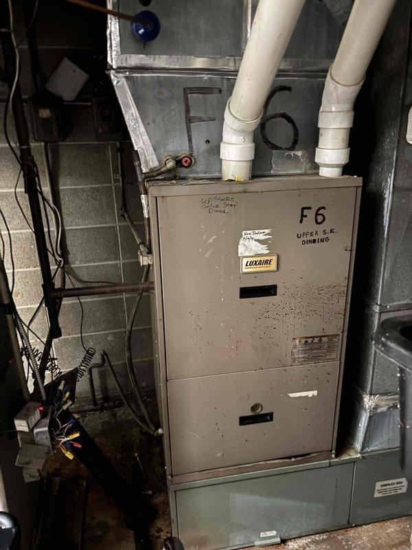 Responded to no cooling complaint on multi-zone residential air conditioning system. Upon inspection, discovered two separate condenser units with critical failures. First condenser diagnosed with failed compressor. Second condenser found to have complete refrigerant loss due to system leak. Connected manifold gauges to verify system pressures and confirm diagnoses. Provided customer with repair quote for compressor replacement on first unit and refrigerant recharge with leak repair on second unit.