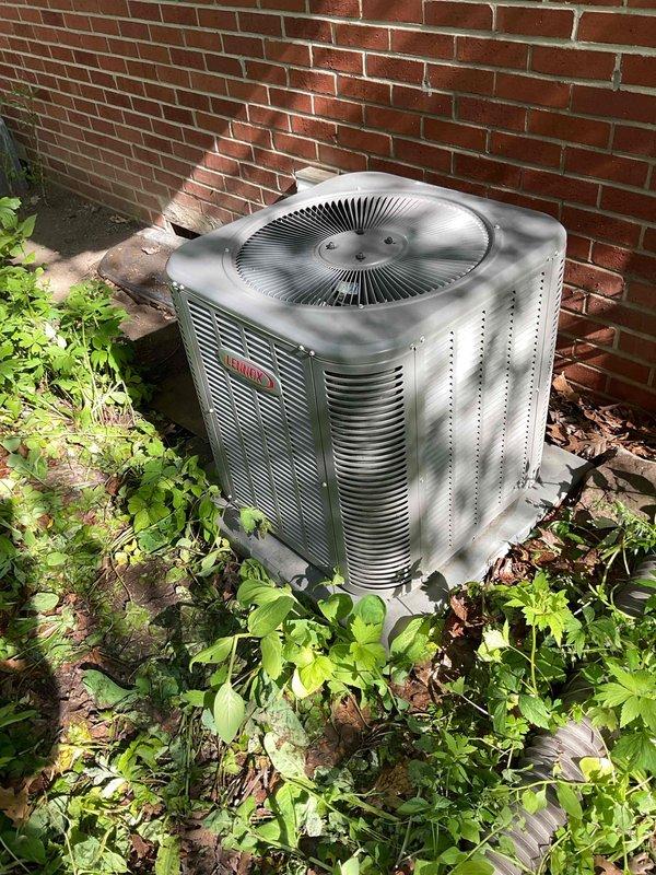 Completed prepaid AC clean and check on Lennox condenser unit. Performed thorough inspection of outdoor unit, including examination of condenser coils, fan operation, and electrical connections. Cleaned debris and vegetation growth from around unit base and perimeter to ensure proper airflow and clearance. Verified fan motor operation and checked refrigerant lines for proper insulation. Unit found to be operating within normal parameters following service completion.