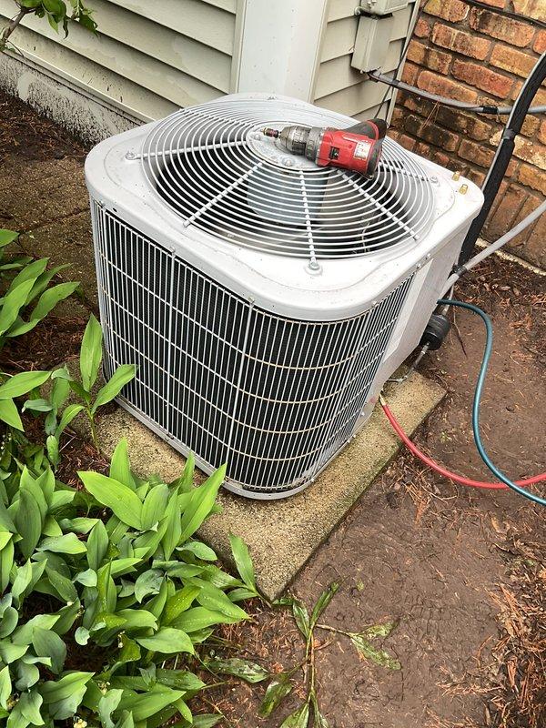 Performed complete air conditioning system inspection and maintenance on residential split system. System was found to be low on R-410A refrigerant; added one pound to restore proper charge levels. Conducted thorough leak check on all refrigerant lines, coils, and connections with no leaks detected. Cleaned condenser unit and completed operational verification to ensure system performance met manufacturer specifications.