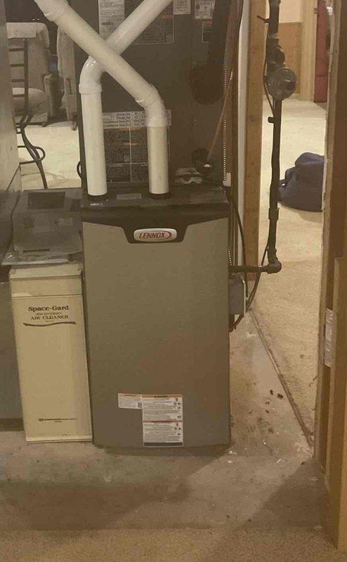 Responded to no cooling call with urgent warning light displaying Code 163. Upon arrival, inspected Lennox furnace system and associated components including Space-Gard air cleaner unit. Diagnosed system malfunction, cleared error code, and restored cooling operation to normal functionality.