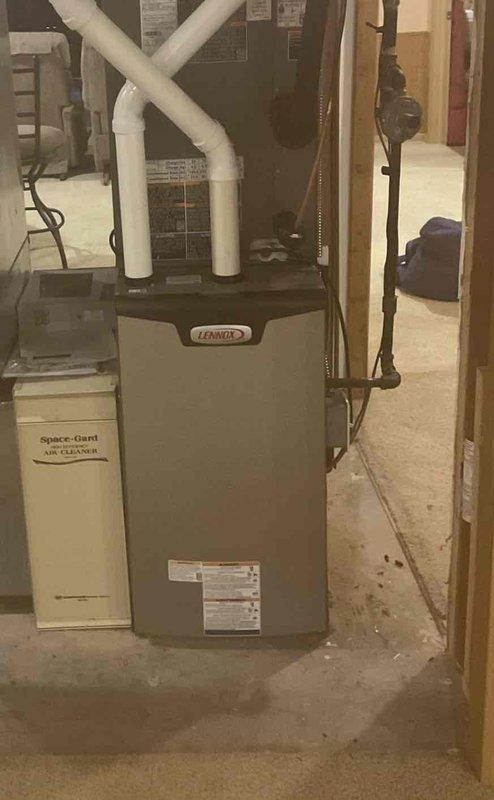 Responded to no cooling call with urgent warning light displaying Code 163. Upon arrival, inspected Lennox furnace system and associated components including Space-Gard air cleaner unit. Diagnosed system malfunction, cleared error code, and restored cooling operation to normal functionality.