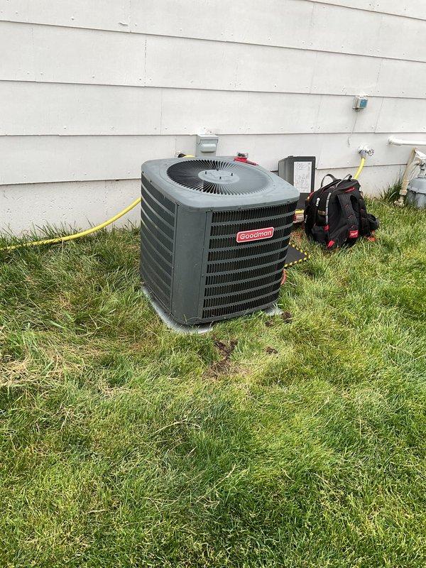 Responded to no cooling complaint on residential air conditioning system. Upon inspection, found outdoor condensing unit with heavily contaminated condenser coil and protective screening covered with dirt, debris, and organic matter restricting airflow. Indoor system equipped with severely restricted air filter impeding proper system operation.

Performed thorough condenser coil cleaning by rinsing down exterior unit to restore adequate airflow through heat exchanger. Replaced restrictive air filter with new filter provided by homeowner. Replaced thermostat batteries to ensure proper system control and operation. System tested and confirmed returning to normal cooling operation following cleaning and maintenance procedures.