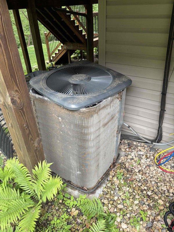 Completed comprehensive tune-up service on residential heating and cooling system. Performed thorough inspection and cleaning of furnace and air conditioning condenser unit. Condenser coil was heavily soiled with accumulated dirt and debris, significantly impacting heat transfer efficiency. Cleaned condenser coil to restore proper airflow and system performance. Verified all condensate drains are clear and flowing properly with no blockages present. All system components inspected and found to be operating within normal parameters.