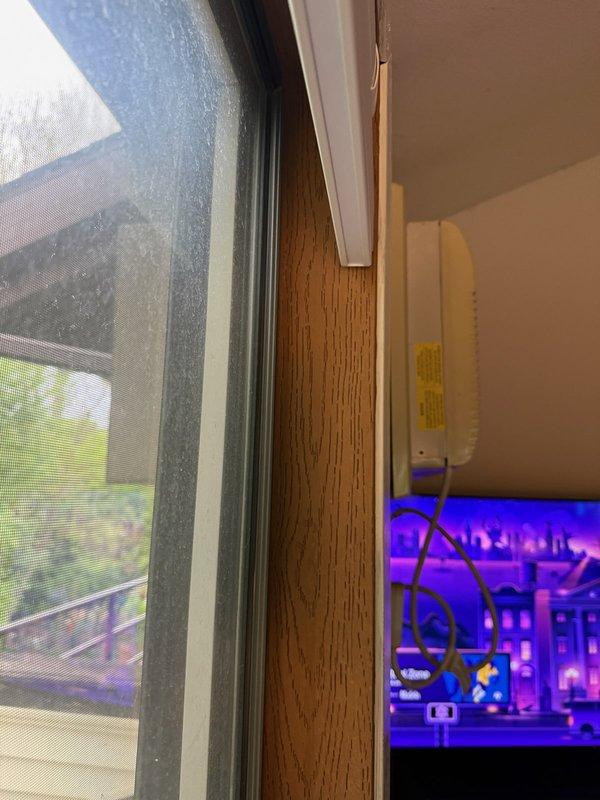 Completed installation of customer-provided through-the-wall air conditioning unit. Customer had begun the installation but required professional assistance to properly complete the mounting, secure the unit within the wall opening, establish electrical connection to existing outlet, and verify operational functionality. Unit is now fully operational with digital controls displaying proper temperature settings.