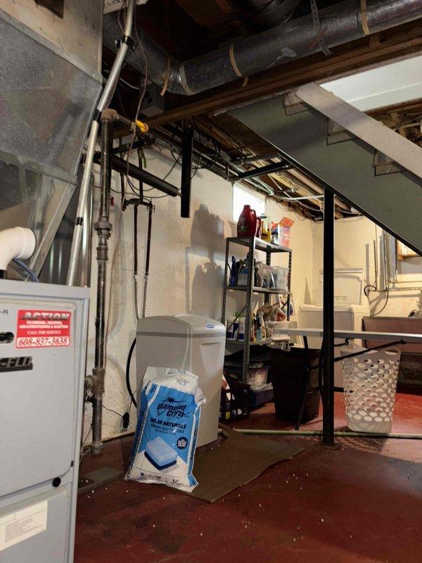 Performed routine A/C clean and check on R22 system. Unit exhibited icing after 25 minutes of runtime due to dirty condenser coil and low refrigerant charge. Cleaned coil thoroughly to restore proper airflow and heat transfer. Measured system temperature at 42.1°F during diagnostics. Due to age of R22 equipment, low refrigerant levels, and phase-out of R22 refrigerant, recommended system replacement to customer rather than recharging refrigerant.