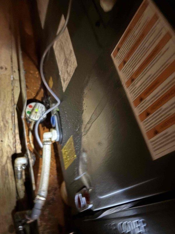 # HVAC No Cool Service Call - Frozen Evaporator Coil

Responded to no cooling complaint with system running continuously. Upon arrival, confirmed evaporator coil was completely frozen, restricting airflow and preventing heat exchange. Unit located in attic space with air handler accessible through crawl space entry.

## Initial Diagnostics

Verified thermostat calling for cooling with compressor and blower motor operational. Measured supply air temperature at registers showing no temperature drop from ambient. Inspected air handler and found evaporator coil encased in ice, indicating refrigerant flow issue or restricted airflow condition.

## Primary Findings

Observed severely restricted airflow due to inadequate filtration maintenance. Filter media showed significant loading with debris accumulation. Checked static pressure across coil assembly and confirmed elevated readings consistent with airflow restriction. System had been operating in frozen state for extended period based on i