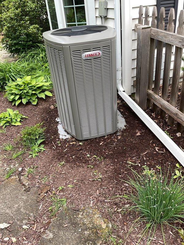 Performed seasonal clean and check service on residential Lennox air conditioning system. Unit inspected and cleaned per maintenance protocol; condenser operating within normal parameters with proper airflow through coils and adequate clearance from surrounding landscaping. All components functioning correctly at time of service completion.
