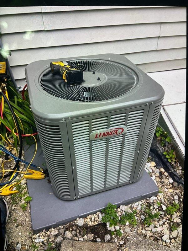 Performed spring startup and commissioning on Lennox air conditioning system that was installed during winter months. Conducted system diagnostics using digital temperature measurement tools, verified proper operation of outdoor condensing unit, and confirmed all electrical connections were secure. Unit tested successfully with no issues found; system is operational and ready for cooling season.