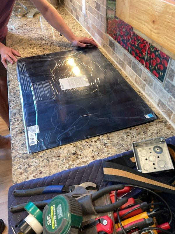 Responded to service call for kitchen appliance conversion from gas to electric cooktop. Installed 30 amp 240-volt dedicated circuit to power new electric cooktop unit in kitchen, ensuring proper electrical supply and code compliance. Successfully capped existing gas line within kitchen cabinet to eliminate potential gas leak hazard and complete transition to electric cooking appliance.