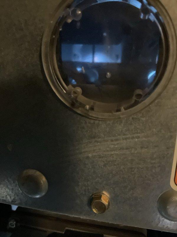 Responded to no-heat call on 20-year-old Carrier furnace experiencing loud operational noise. Upon inspection, identified inducer motor as source of excessive noise due to inadequate lubrication. Applied oil to inducer motor bearings, which eliminated the noise and restored normal operation. Unit shows significant wear consistent with age, and overall condition indicates system is in rough shape with potential for future service needs.