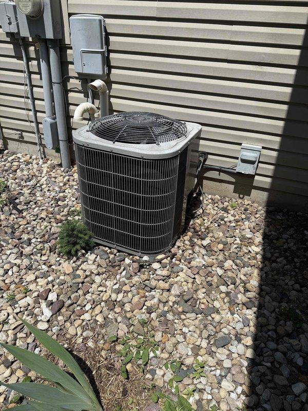 Performed air conditioning clean and check on outdoor condenser unit. Found condenser coil heavily soiled with dirt and debris accumulation affecting heat transfer efficiency. Thoroughly cleaned condenser coil to restore proper airflow and system performance. Unit operational upon completion of maintenance.