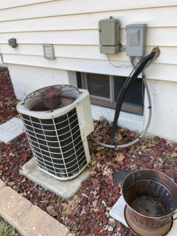 Responded to no cooling complaint on residential split system air conditioner. Upon arrival, confirmed outdoor condensing unit fan was not operating. Diagnosed failed dual run capacitor preventing compressor and condenser fan motor from starting. Removed defective capacitor and installed new replacement capacitor with proper microfarad ratings for both compressor and fan motor circuits. Verified system startup, confirmed proper fan operation and cooling cycle restored.