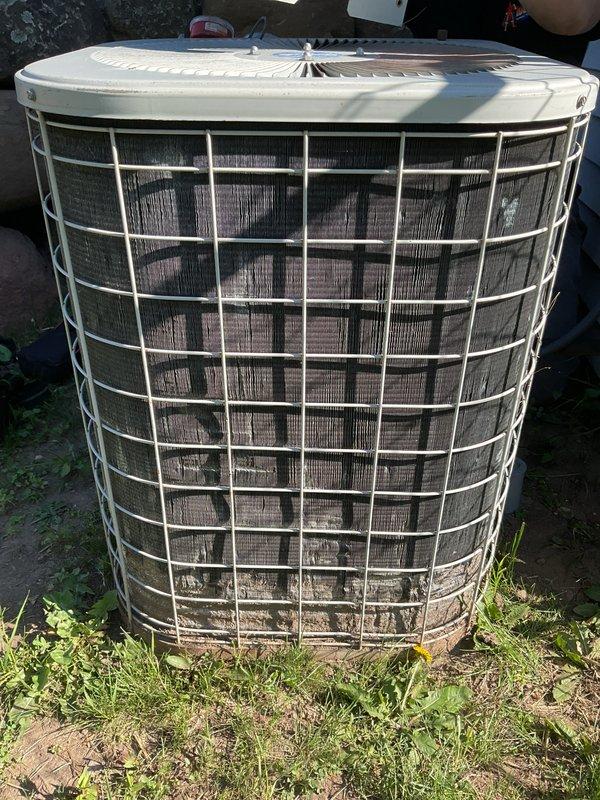 Performed clean and check service on 24-year-old Payne air conditioning system. Completed thorough inspection of outdoor condenser unit and indoor furnace components. System operating properly with no issues identified during service visit.