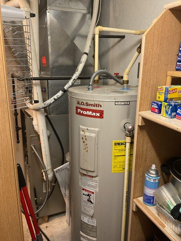 Completed preventive maintenance and cleaning on a 20-year-old residential air conditioning system with R-22 refrigerant. Performed thorough inspection of evaporator coil (Model CNBSXW024017AAAA), cleaned accessible components, verified system operation, and documented equipment condition with photos for service records.