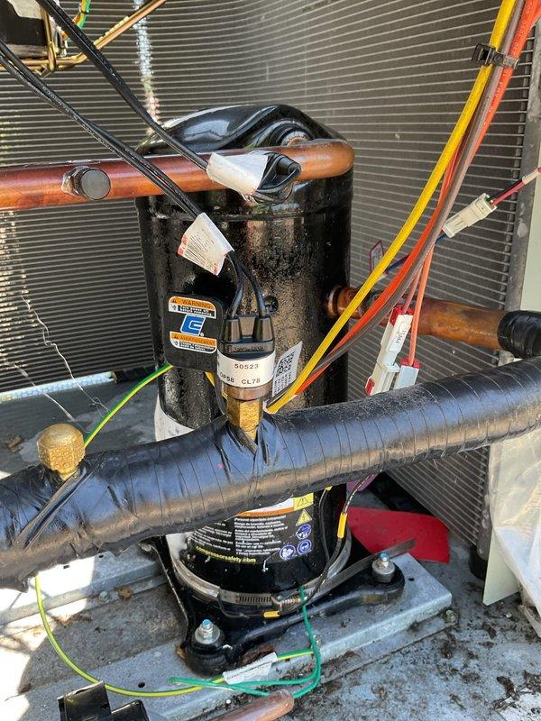 Responded to a no-cooling complaint on a rooftop A/C unit with condenser icing. Upon inspection, diagnosed system as low on refrigerant charge. Added refrigerant to proper levels, verified system operation, and confirmed unit returned to normal cooling function with ice condition resolved.