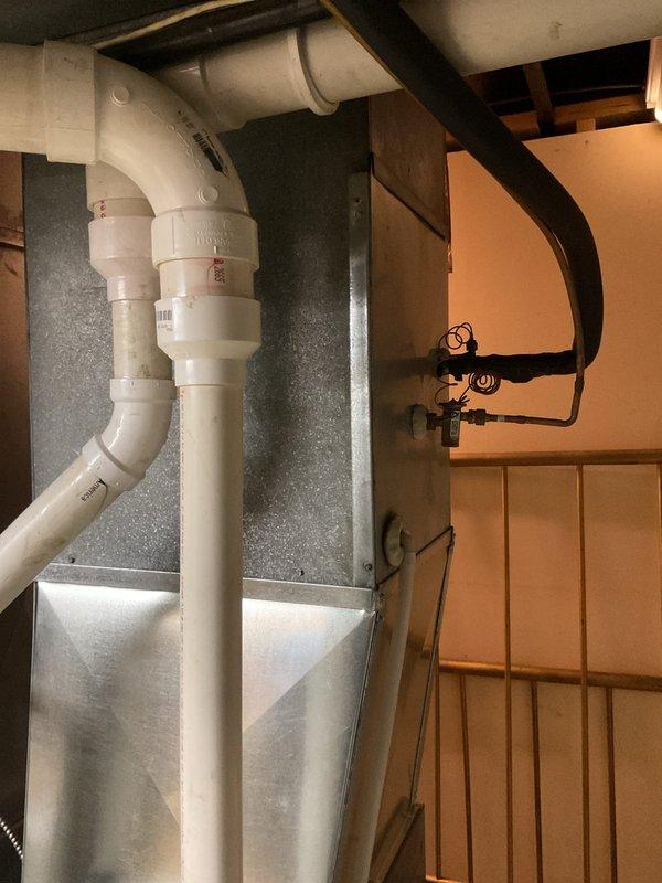 Responded to no cooling complaint on 20-year-old air conditioning system. Upon inspection, determined outdoor unit fan motor had locked rotor condition preventing compressor operation. Diagnosed system as beyond economical repair due to age and component failure. Advised customer that complete system replacement is necessary to restore cooling function.