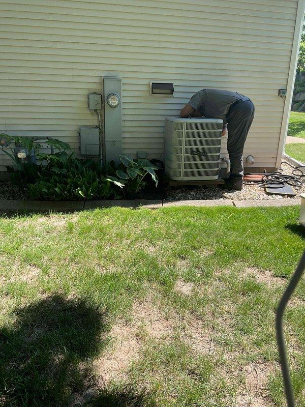 Performed complete air conditioning tune-up and inspection on residential outdoor condensing unit. Replaced dirty air filter, changed thermostat batteries, and thoroughly rinsed condenser coil to remove debris and restore airflow efficiency. Verified refrigerant charge levels within manufacturer specifications and confirmed proper temperature split across the evaporator coil, indicating optimal system performance.