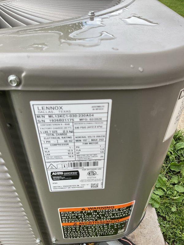 Responded to no cooling complaint on recently installed Lennox ML13XC1-030-230A24 air conditioning system. Found tripped circuit breaker at electrical panel. Replaced faulty breaker with new unit, restoring power to condensing unit. System operational upon departure with proper condensation observed on outdoor unit.