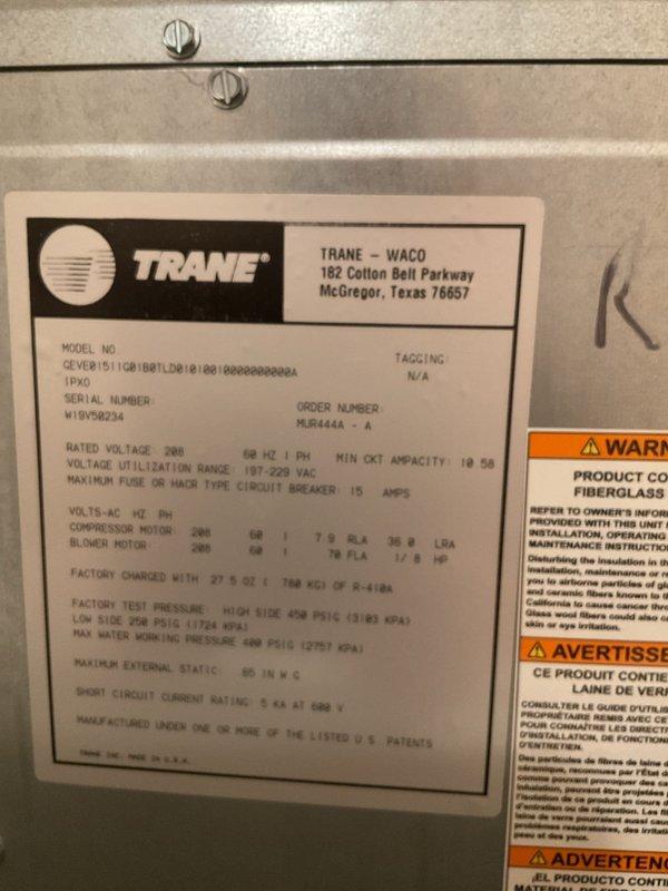 Replaced obsolete Robert Shaw mechanical thermostat with new Honeywell Home digital programmable thermostat on Trane HVAC system. Removed old thermostat, installed new unit, verified proper wiring connections, and tested system operation in cooling mode. System responding correctly to temperature setpoints and functioning as expected.