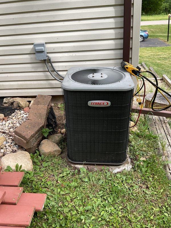 Completed comprehensive clean and check service on both Lennox air conditioning system and furnace. Performed diagnostic testing on outdoor condensing unit using electrical testing equipment to verify proper operation of compressor, capacitor, and electrical components. Inspected and evaluated AprilAire humidifier mounted to Lennox air handler in attic space for reported broken sensor issue. Checked all electrical connections, copper refrigerant lines, and ductwork connections at indoor air handler. Verified proper airflow, examined condensate drainage system, and assessed overall system performance of both heating and cooling equipment to ensure optimal operation for the upcoming season.