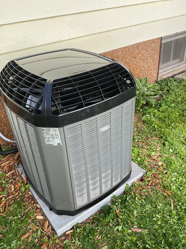 Completed preventive maintenance tune-up on residential outdoor air conditioning unit. Performed comprehensive inspection of condenser coils and fins, determining they were in acceptable condition and did not require combing. Conducted standard cleaning procedures on exterior cabinet, removed debris from around unit, and verified proper airflow through ventilation louvers. Checked electrical connections at disconnect box and confirmed secure mounting on concrete pad. Unit operating within normal parameters upon completion of service.