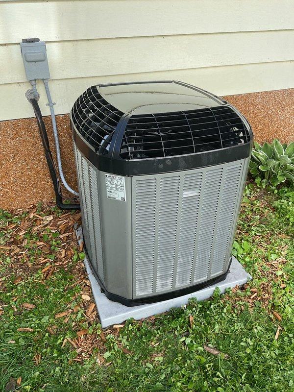 Completed preventive maintenance tune-up on residential outdoor air conditioning unit. Performed comprehensive inspection of condenser coils and fins, determining they were in acceptable condition and did not require combing. Conducted standard cleaning procedures on exterior cabinet, removed debris from around unit, and verified proper airflow through ventilation louvers. Checked electrical connections at disconnect box and confirmed secure mounting on concrete pad. Unit operating within normal parameters upon completion of service.