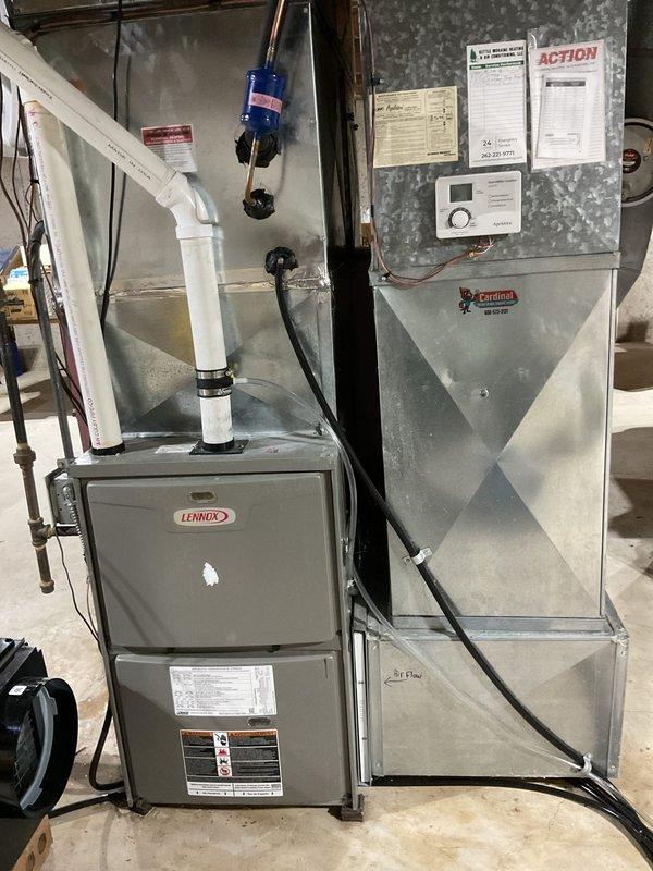 Completed routine cooling maintenance visit on 2011 Lennox air conditioning package system. Performed basic cleaning and operational check on both indoor air handler with furnace unit and outdoor condenser unit, verified AprilAire equipment functionality, confirmed all components operating within normal parameters.