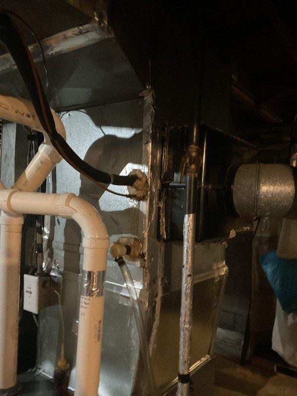 Performed annual air conditioning clean and check maintenance service. Outdoor condensing unit was found to be somewhat dirty with accumulated debris and contamination. Thoroughly cleaned condenser coil and unit exterior, then completed full system operational checkout to ensure proper cooling performance.