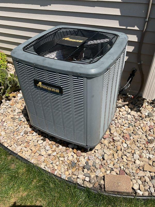 Performed prepaid Action Family Rewards Cooling Visit on Amana outdoor condensing unit. Cleaned dirty outdoor condenser coil and checked system operation. Unit inspected and verified to be operating within normal parameters with all components functioning properly.