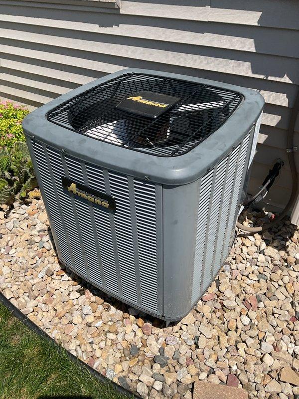 Performed prepaid Action Family Rewards Cooling Visit on Amana outdoor condensing unit. Cleaned dirty outdoor condenser coil and checked system operation. Unit inspected and verified to be operating within normal parameters with all components functioning properly.