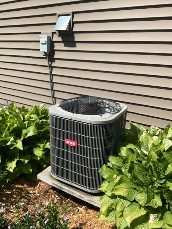 Performed comprehensive air conditioning clean and check on Bryant outdoor condensing unit. During diagnostic testing, identified failed capacitor preventing proper system operation. Replaced defective capacitor with new unit, restoring full functionality to the AC system.