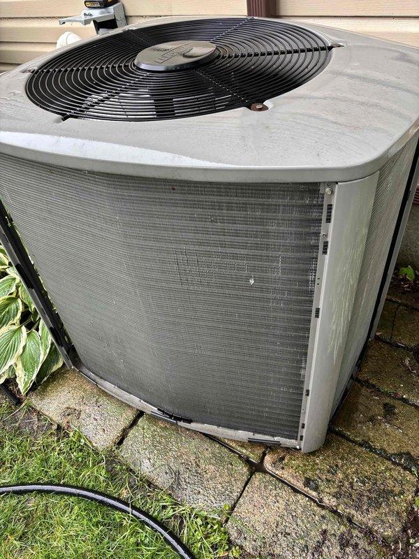 Performed comprehensive air conditioning clean and check service on outdoor condenser unit. Upon inspection, found condenser coil heavily soiled with dirt and debris accumulation, restricting airflow and reducing system efficiency. Thoroughly cleaned condenser coil to restore proper heat transfer and optimal performance. Completed standard tune-up procedures to ensure unit is operating within manufacturer specifications for the cooling season.