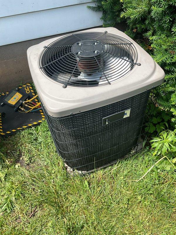Responded to no cooling complaint at residential property. Upon arrival, found outdoor condenser unit with frozen evaporator coil, consistent with tenant's report of intermittent cooling failure requiring system shutdown to restore operation. Performed complete system thaw-out procedure and thorough cleaning of condenser unit to remove accumulated debris and restore proper airflow. Unit returned to normal operation with adequate cooling capacity after service completion.