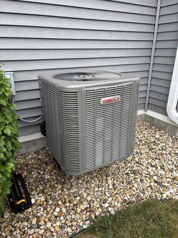 Responded to service call for Lennox air conditioning system that continued running approximately 8 minutes after reaching set temperature. Diagnosed thermostat malfunction causing delayed system shutdown. Reprogrammed thermostat to restore proper operation and cycling functionality.