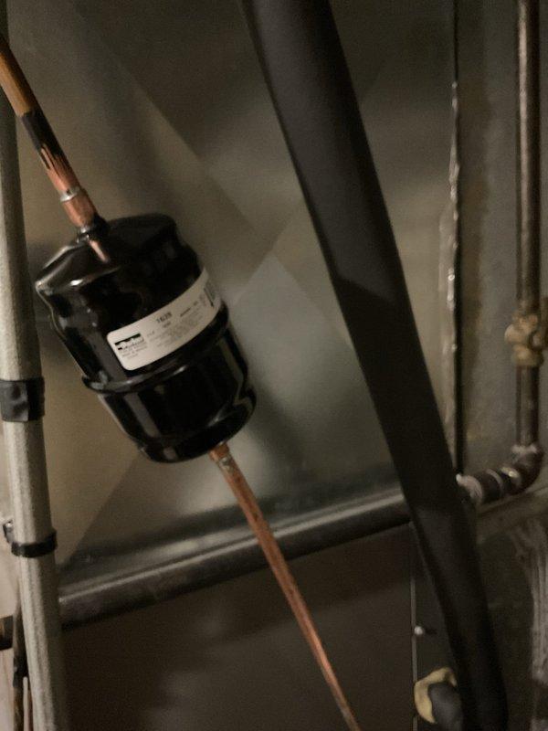 Diagnosed failed compressor on residential air conditioning system. Removed and replaced defective compressor unit along with line dryer to ensure system integrity and prevent future contamination. System restored to full operational status.