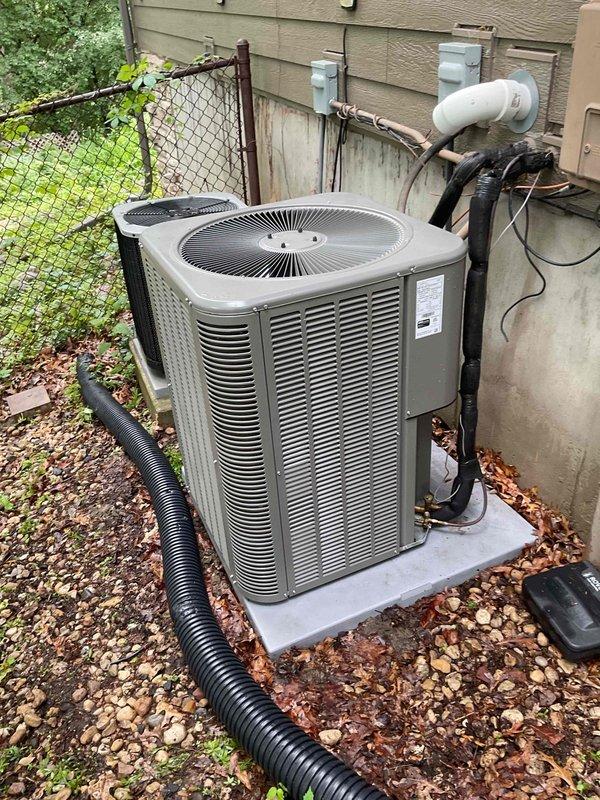 Responded to no cooling complaint on residential air conditioning system. Upon inspection, found unit extremely dirty with low refrigerant charge. Evidence of previous ice buildup on evaporator coil had melted, with condensation present on suction line. Performed thorough cleaning of condenser coil and system components to restore proper airflow and heat transfer. Added refrigerant to bring system to manufacturer specifications. Unit tested and operating normally with proper cooling upon completion.
