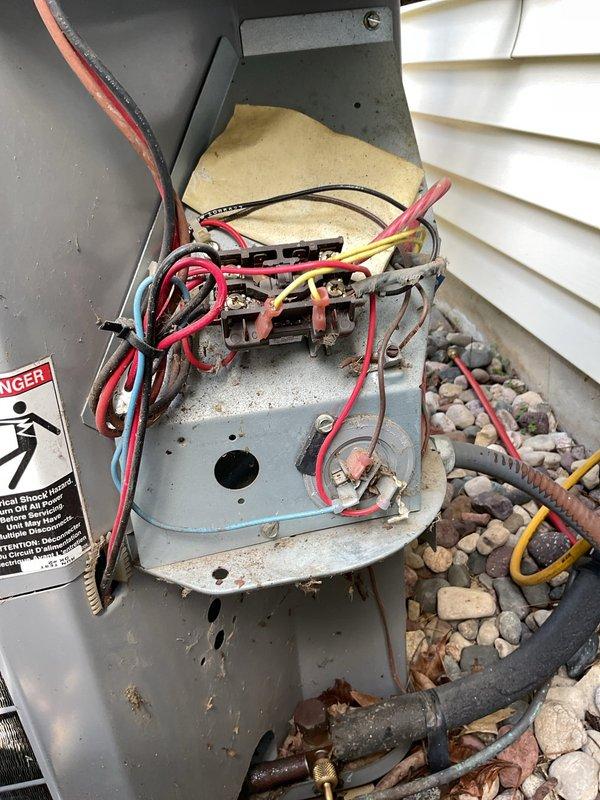 Responded to service call for 16-year-old residential air conditioning unit experiencing refrigerant leak and lack of cooling. Upon inspection, confirmed system was low on refrigerant and identified active leak in outdoor condensing unit. Performed comprehensive system evaluation including electrical connections, condenser coil condition, and compressor operation. Due to the age of the equipment, extent of the leak, and cost-effectiveness of repair versus replacement, advised customer that unit replacement is recommended at this time. Documented system condition with photographs showing interior components of outdoor unit and associated indoor air handler zone control panel. Customer informed of findings and replacement options.