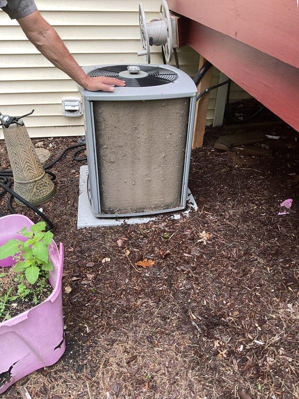 Performed comprehensive inspection and cleaning check on outdoor air conditioning condenser unit. Unit exhibited significant debris accumulation on filter and front panel but remained operational and passed inspection criteria required for state surveyor documentation. Recommended relocating dryer vent to prevent future debris buildup on condenser unit.