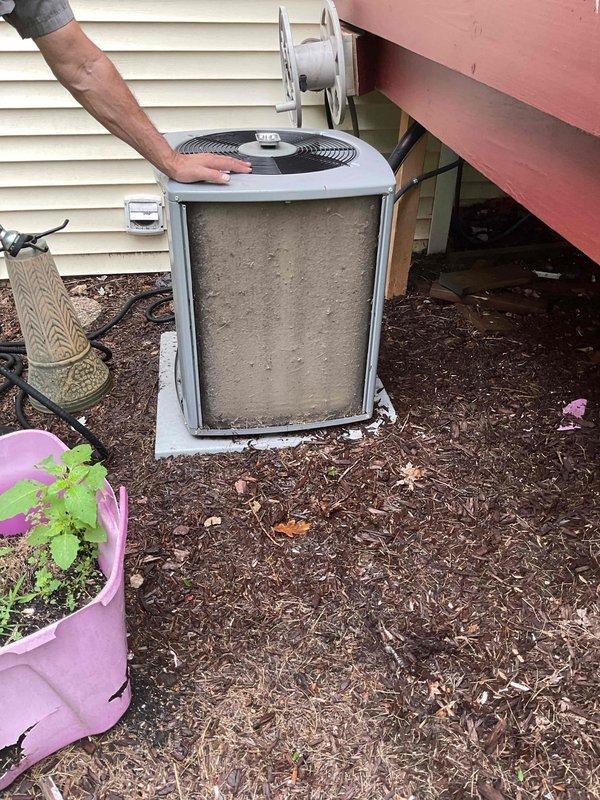 Performed comprehensive inspection and cleaning check on outdoor air conditioning condenser unit. Unit exhibited significant debris accumulation on filter and front panel but remained operational and passed inspection criteria required for state surveyor documentation. Recommended relocating dryer vent to prevent future debris buildup on condenser unit.