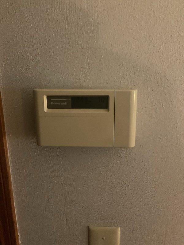 Performed comprehensive air conditioning clean and check service on residential HVAC system located in basement mechanical room. Inspected air handler unit, verified proper operation of all components, and cleaned system as needed. Confirmed thermostat functionality and system controls operating within normal parameters.