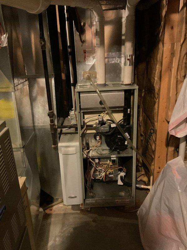 Responded to no cooling complaint with frozen evaporator coils on American Standard system. Diagnosed failed furnace control board preventing proper system operation. Replaced defective control board, restored power to unit, and verified proper system functionality with normal cooling operation resumed.