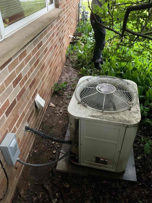 Responded to a no cooling complaint on a 15-year-old residential air conditioning system. Upon inspection, diagnosed low refrigerant charge as the cause of inadequate cooling throughout the home. The outdoor condenser unit showed significant age-related wear and weathering consistent with its service life. Given the system's age and the cost of repair versus replacement, recommended full system replacement rather than recharging the existing unit.