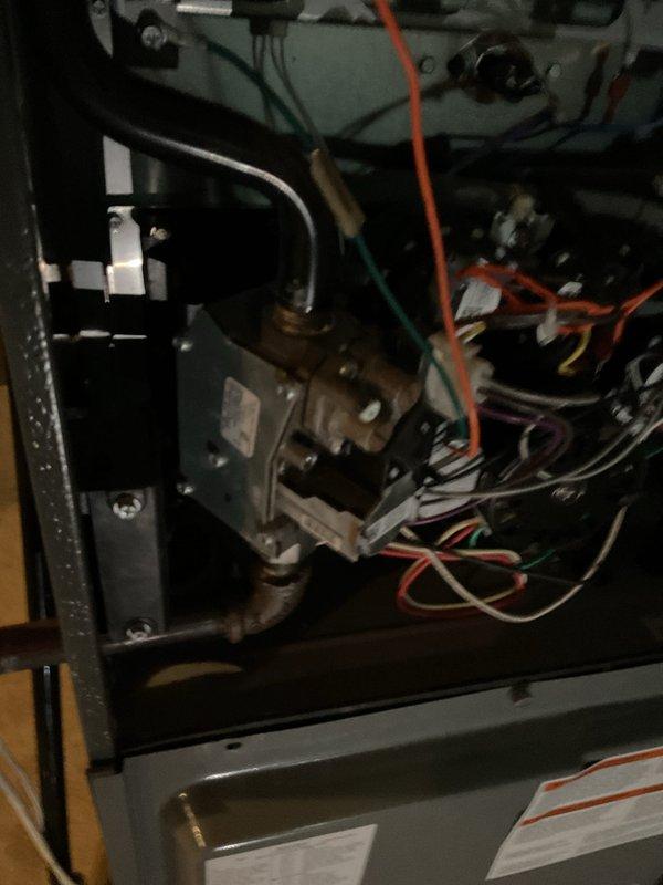 Responded to reported gas valve leak on Goodman furnace following recent maintenance service. Conducted thorough leak detection inspection of gas valve assembly and all gas connections with unit gas supply shut off. Unable to detect or confirm any active gas leak at valve body, connections, or associated piping using standard leak detection methods.