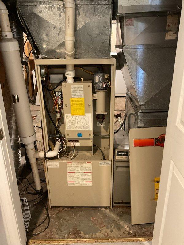 Responded to no cooling complaint on residential HVAC system. Upon arrival, performed comprehensive system inspection and discovered damper serving upper level was not fully open, restricting airflow to second floor zones. Adjusted damper to proper position and verified adequate airflow distribution throughout ductwork. Conducted standard maintenance cleaning and operational check on 30-year-old air conditioning unit. All components inspected including condenser coils, electrical connections, and refrigerant lines. System tested and confirmed operational, though unit age indicates replacement should be considered for long-term reliability. Customer advised of findings and system returned to normal cooling operation.