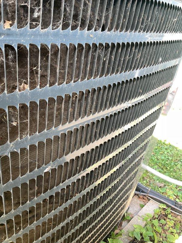 Responded to no cooling complaint on Goodman GFXC 18 system. Initial error codes indicated locked rotor condition suggesting potential compressor failure. Upon inspection, found condenser coil heavily contaminated with dirt and debris, and system significantly overcharged with refrigerant. Removed excess refrigerant to bring system back to manufacturer specifications and recommended thorough coil cleaning to restore proper airflow and heat transfer. System operational after correcting refrigerant charge; advised customer that warranty coverage should be verified for this unit.
