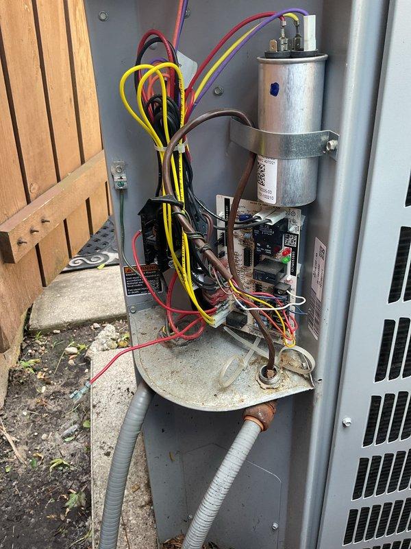 Responded to no cooling complaint on residential air conditioning system. Upon arrival, discovered broken connector on low voltage control wiring preventing unit operation. Repaired damaged wiring connection and restored proper electrical continuity to control circuit. Verified system startup and checked refrigerant pressures to confirm proper operation. Unit tested successfully and returned to normal cooling function.