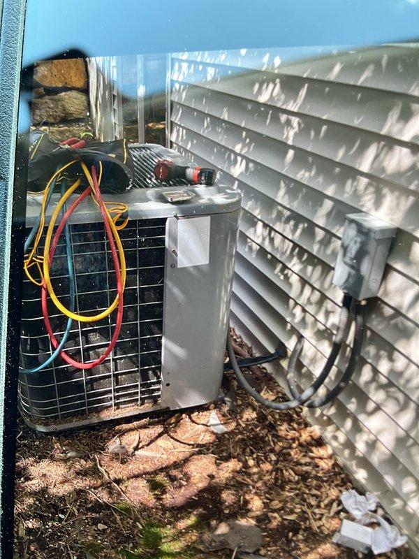 Responded to no cooling complaint on R-22 air conditioning system. Upon arrival, found unit not running due to tripped electrical protection. Diagnostic testing revealed multiple component failures including defective fan control board, failed blower starting capacitor, and faulty condenser capacitor. Connected manifold gauges to measure system pressures and confirmed refrigerant charge was significantly low. Recommended complete replacement of failed electrical components and proper refrigerant recharge to restore system operation and cooling capacity.