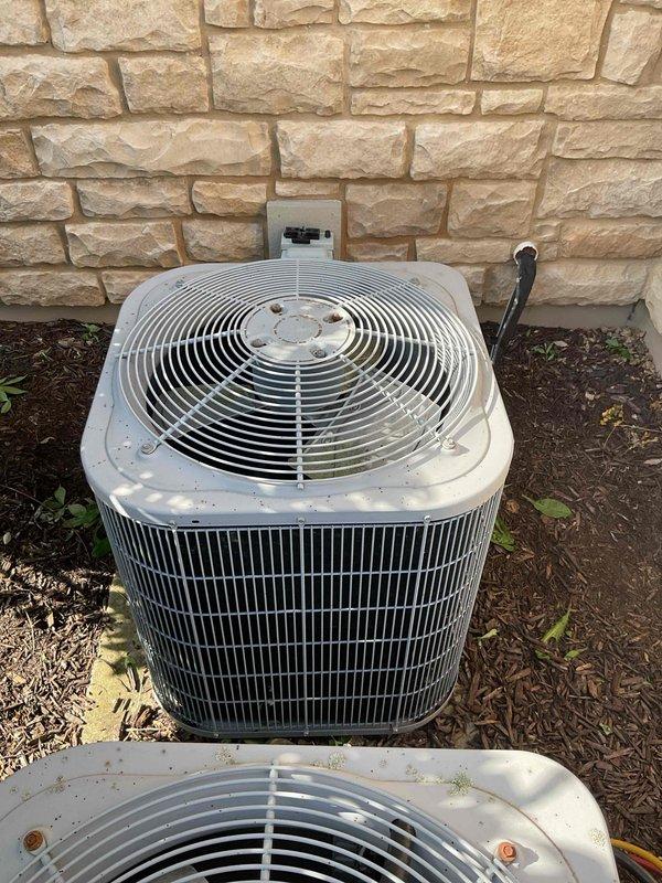 Performed annual clean and check service on older residential air conditioning system. Completed visual inspection of outdoor condenser unit, verified proper fan operation, and performed basic cleaning of exterior components. Unit remains operational and in acceptable working condition for its age.