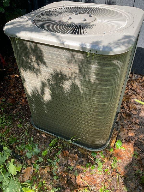 Responded to no cooling complaint with water leaking from furnace. Found severely restricted airflow due to plugged air filter and debris-blocked outdoor condensing unit. Replaced air filter, cleaned condenser coil and removed leaves and vegetation from exterior unit. Verified proper airflow, tested system operation, and confirmed unit cooling properly with no further water discharge from furnace.